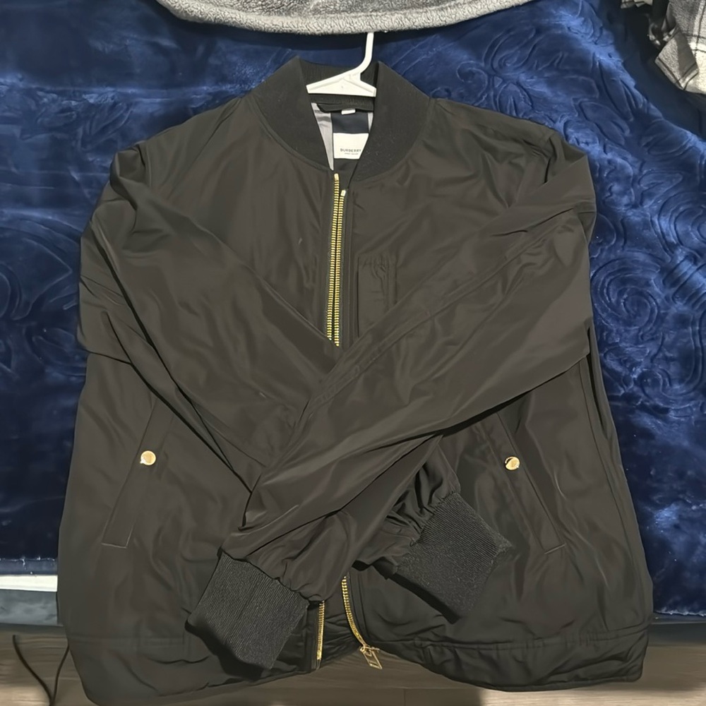 Im selling this Burberry bomber because bombers are not my style.